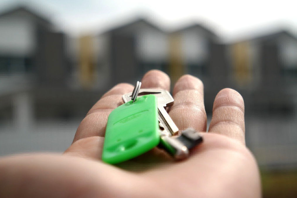 Holding keys to a house